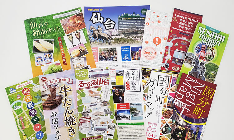 Supply of tourist brochures and convention bags